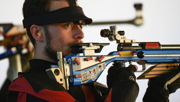 Sergei Kamensky (Russia) during the qualifying round of the men's 50m rifle 3 positions event at the XXXI Summer Olympics - Sputnik International