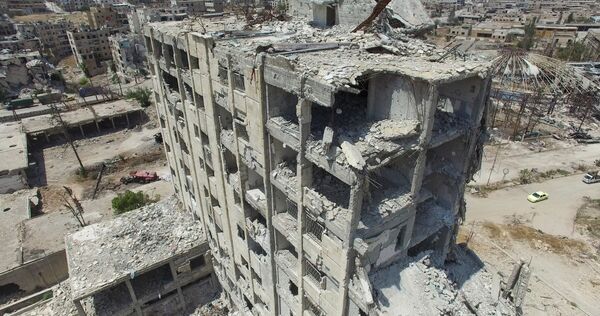 A destroyed building in the Bani Zeid district in north Aleppo A destroyed building in the Bani Zeid district in north Aleppo - Sputnik International