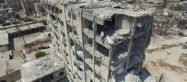 A destroyed building in the Bani Zeid district in north Aleppo - Sputnik International