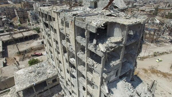 A destroyed building in the Bani Zeid district in north Aleppo - Sputnik International