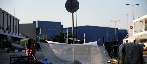 A makeshift tent at the camp outside the disused Hellenikon airport, where stranded refugees and migrants are temporarily accommodated in Athens, Greece, August 10, 2016 A makeshift tent at the camp outside the disused Hellenikon airport, where stranded refugees and migrants are temporarily accommodated in Athens, Greece, August 10, 2016 - Sputnik International