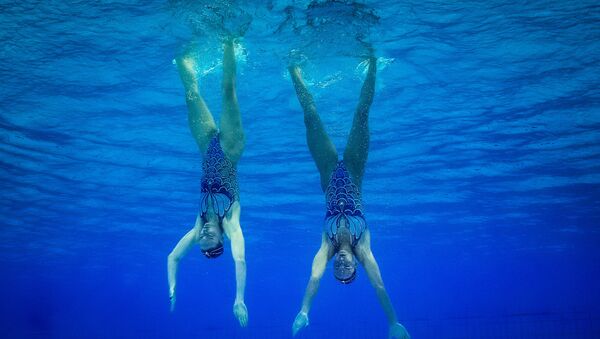 2016 Rio Olympics. Russian synchronized swimmers Svetlana Romashina and Natalya Ischenko - Sputnik International