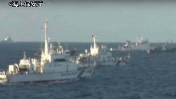 Chinese Coast Guard ships allegedly violating Japanese waters near the Senkaku islands - Sputnik International