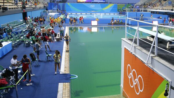 A general view shows the green water in the pool before the Women's Synchronised 10m Platform Final as part of the diving event at the Rio 2016 Olympic Games at the Maria Lenk Aquatics Stadium in Rio de Janeiro - Sputnik International