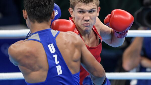Light welter Vitaly Dunaitsev (Russia) in a semi-final of the boxing competitions at the XXXI Summer Olympics - Sputnik International