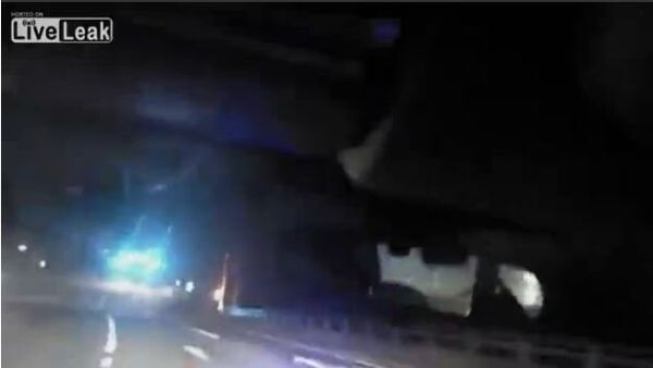 Bodycam Shows Cop Save Man Trapped in Burning Car - Sputnik International