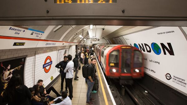 A London Underground train arrives at Oxford Circus station in central London on August 20, 2016, following the launch of the 24 hour night tube service - Sputnik International