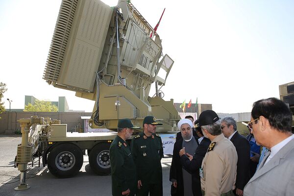 Iran's President Hassan Rouhani (3rd L) and Iranian Defence Minister Hossein Dehghan (2nd L) stand in front of the new air defense missile system Bavar-373, in Tehran, Iran August 21, 2016 - Sputnik International