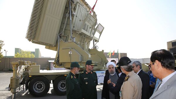 Iran's President Hassan Rouhani (3rd L) and Iranian Defence Minister Hossein Dehghan (2nd L) stand in front of the new air defense missile system Bavar-373, in Tehran, Iran August 21, 2016 - Sputnik International