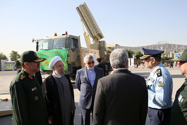 Iran's President Hassan Rouhani (2nd L) and Defence Minister Hossein Dehghan (L) stand near the new air defense missile system Bavar-373, in Tehran, Iran August 21, 2016 Iran's President Hassan Rouhani (2nd L) and Defence Minister Hossein Dehghan (L) stand near the new air defense missile system Bavar-373, in Tehran, Iran August 21, 2016 - Sputnik International