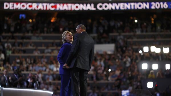 U.S. President Barack Obama and Democratic presidential nominee Hillary Clinton appear onstage together after his speech on the third night at the Democratic National Convention in Philadelphia, Pennsylvania, U.S. July 27, 2016 - Sputnik International