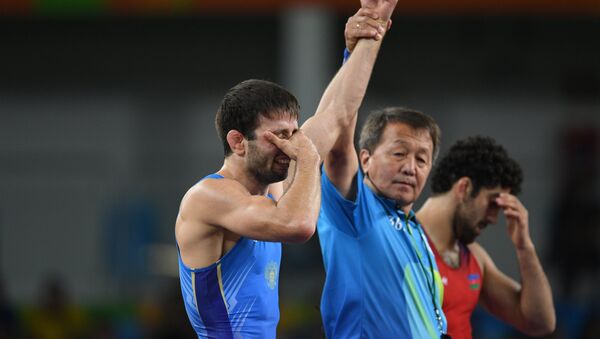 Russian freestyle wrestler Soslan Ramonov on Sunday won the final of the men’s 65 kg competition at the 2016 Rio Olympics. - Sputnik International
