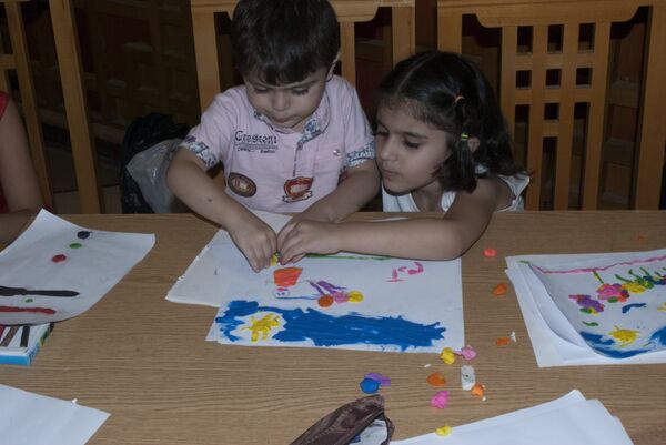 The Syrian children are seen attending a drawing circle in Damascus The Syrian children are seen attending a drawing circle in Damascus - Sputnik International