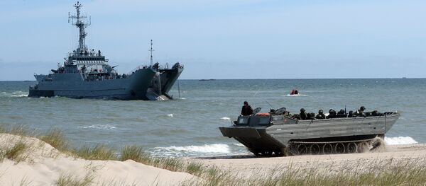 NATO troops make a massive amphibious landing off the coast of Ustka, northern Poland, during NATO military sea exercises BALTOPS (Baltic Operations) on June 17, 2015 in the Baltic Sea NATO troops make a massive amphibious landing off the coast of Ustka, northern Poland, during NATO military sea exercises BALTOPS (Baltic Operations) on June 17, 2015 in the Baltic Sea - Sputnik International