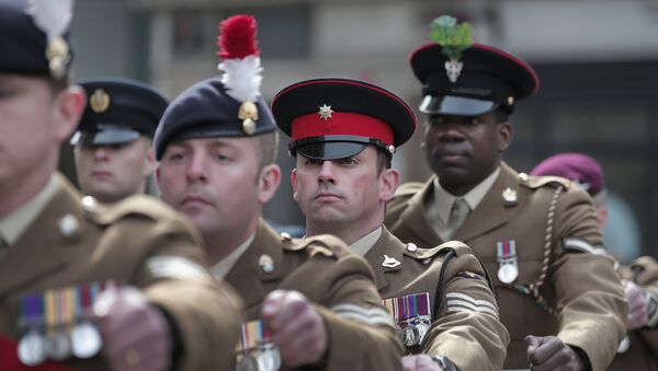 Members of Britain's armed forces parade to their positions outside St Paul’s Cathedral, in central London, for the Service of Commemoration – Afghanistan, Friday, March 13, 2015 - Sputnik International