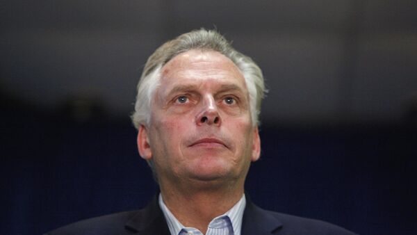 Democratic nominee for Virginia governor Terry McAuliffe stands onstage during a campaign rally in Dale City, Virginia, October 27, 2013 - Sputnik International