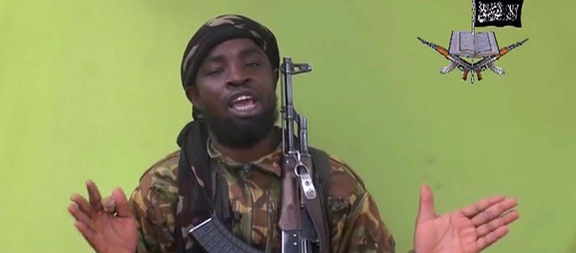 May 12, 2014 file photo taken from video by Nigeria's Boko Haram terrorist network, and shows their leader Abubakar Shekau speaking to the camera - Sputnik International, 1920, 21.05.2021