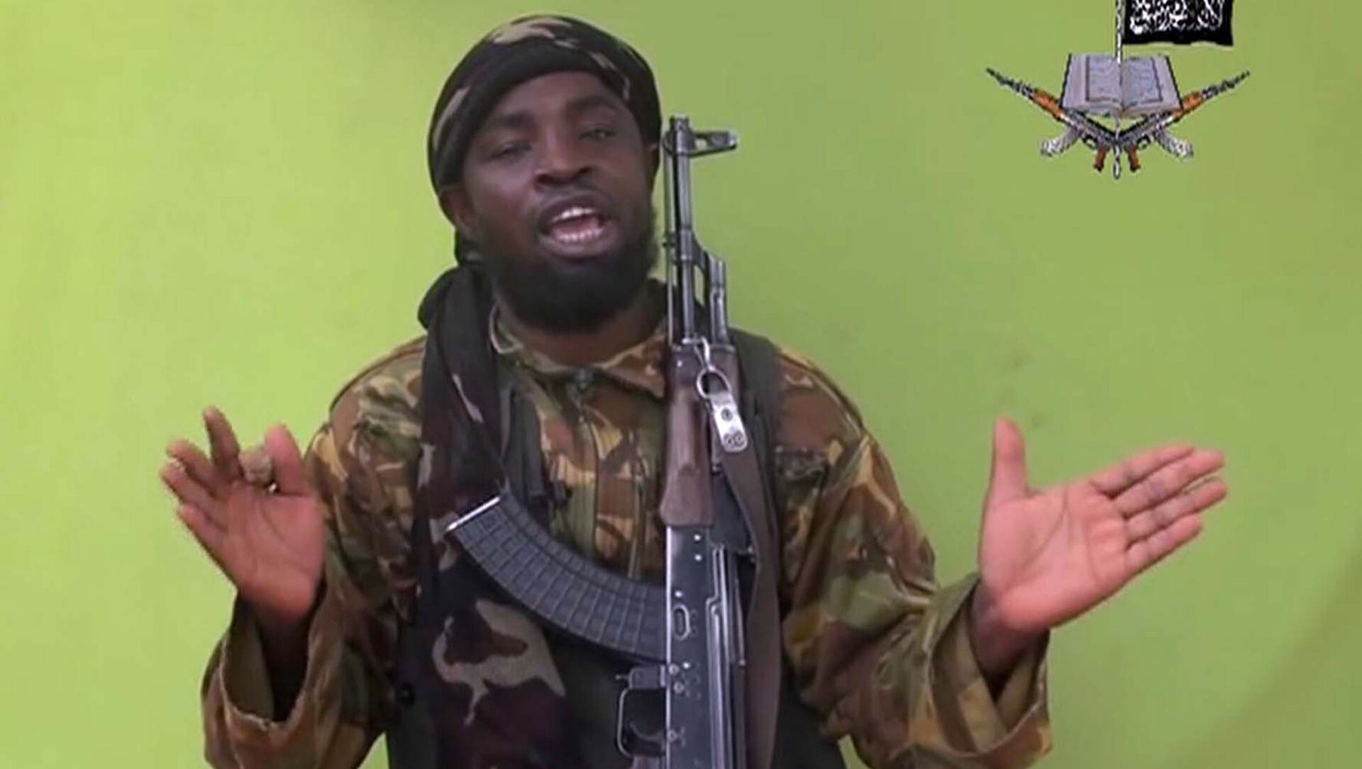 May 12, 2014 file photo taken from video by Nigeria's Boko Haram terrorist network, and shows their leader Abubakar Shekau speaking to the camera - Sputnik International, 1920, 21.05.2021