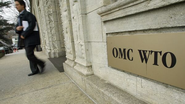 A person gets out of the World Trade Organization (WTO) headquarter in Geneva (File) - Sputnik International