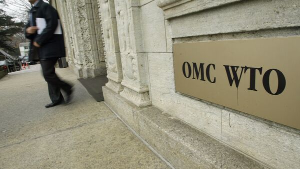 A person gets out of the World Trade Organization (WTO) headquarter in Geneva (File) - Sputnik International