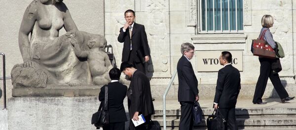 Delegates speak in front of the headquarters of the World Trade Organization, WTO, after the first day session of the World Trade Organization, in Geneva, Switzerland (File) Delegates speak in front of the headquarters of the World Trade Organization, WTO, after the first day session of the World Trade Organization, in Geneva, Switzerland (File) - Sputnik International