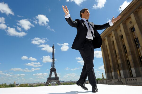 France's President and UMP party candidate for his re-election in the 2012 French presidential elections, Nicolas Sarkozy waves to supporters as he arrives on stage at Trocadero square to deliver a speech during a campaign rally in front the Eiffel Tower in Paris, France May 1, 2012. France's President and UMP party candidate for his re-election in the 2012 French presidential elections, Nicolas Sarkozy waves to supporters as he arrives on stage at Trocadero square to deliver a speech during a campaign rally in front the Eiffel Tower in Paris, France May 1, 2012. - Sputnik International