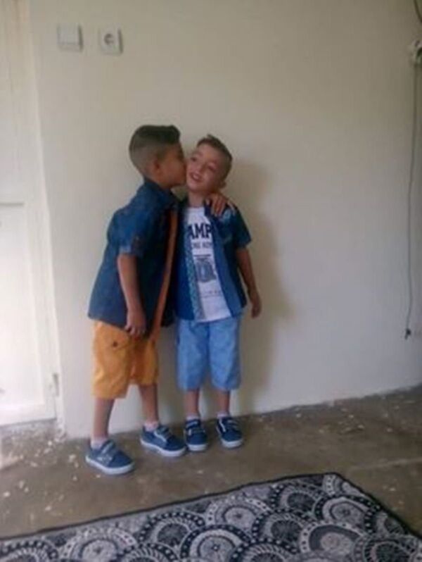 Hasan's boys Usama (left) and Hussein. Hasan's boys Usama (left) and Hussein. - Sputnik International