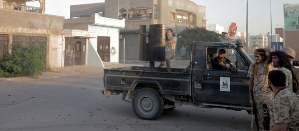 Fighters from Libyan forces allied with the U.N.-backed government take position during a battle with Islamic State fighters in Sirte, Libya August 21, 2016 Fighters from Libyan forces allied with the U.N.-backed government take position during a battle with Islamic State fighters in Sirte, Libya August 21, 2016 - Sputnik International
