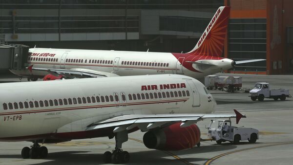 Air India planes are parked on the tarmac at the Terminal 3 of Indira Gandhi International Airport in New Delhi, India, Friday, May 18, 2012 - Sputnik International