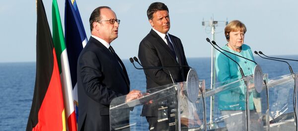 Italian Prime Minister Matteo Renzi, German Chancellor Angela Merkel (R) and French President Francois Hollande (L) lead a news conference on the Italian aircraft carrier Garibaldi off the coast of Ventotene island, central Italy, August 22, 2016. Italian Prime Minister Matteo Renzi, German Chancellor Angela Merkel (R) and French President Francois Hollande (L) lead a news conference on the Italian aircraft carrier Garibaldi off the coast of Ventotene island, central Italy, August 22, 2016. - Sputnik International