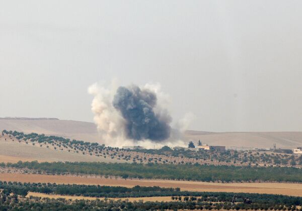 Smoke rises from the Syrian border town of Jarablus as it is pictured from the Turkish town of Karkamis, in the southeastern Gaziantep province, Turkey, August 24, 2016 Smoke rises from the Syrian border town of Jarablus as it is pictured from the Turkish town of Karkamis, in the southeastern Gaziantep province, Turkey, August 24, 2016 - Sputnik International
