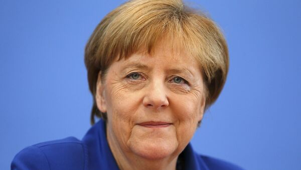 German Chancellor Angela Merkel addresses a news conference in Berlin, Germany, July 28, 2016. - Sputnik International