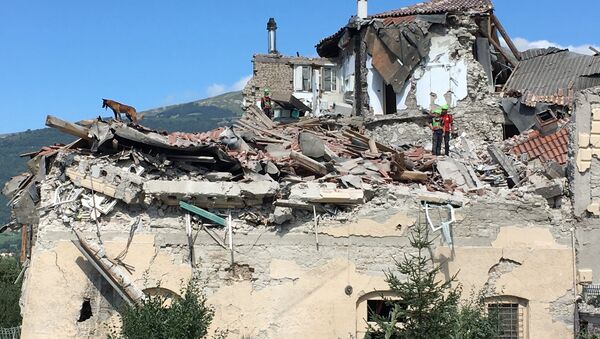 Buildings destroyed by an earthquake in Amatrice - Sputnik International