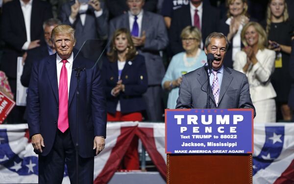 Nigel Farage, ex-leader of the British UKIP party, speaks as Republican presidential candidate Donald Trump, left, listens, at Trump's campaign rally in Jackson, Miss., Wednesday, Aug. 24, 2016.  - Sputnik International
