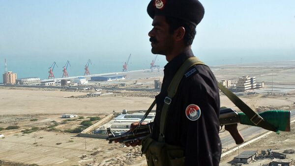 A Pakistan security personnel stands guard near the the Beijing-funded megaport of Gwadar, in southwestern Pakistan - Sputnik International