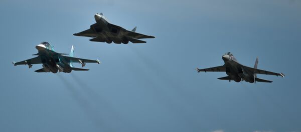 From left: A Sukhoi-34, a T-50 and a Sukhoi-35S perform a demo flight at the MAKS 2015 International Aviation and Space Salon in Zhukovsky outside Moscow From left: A Sukhoi-34, a T-50 and a Sukhoi-35S perform a demo flight at the MAKS 2015 International Aviation and Space Salon in Zhukovsky outside Moscow - Sputnik International