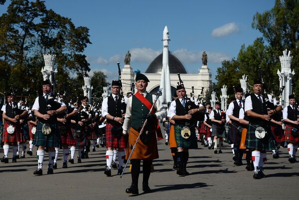 The participants in the 2016 International Military Music Festival “Spasskaya Tower” parade on the VDNKh central alley, Moscow The participants in the 2016 International Military Music Festival “Spasskaya Tower” parade on the VDNKh central alley, Moscow - Sputnik International