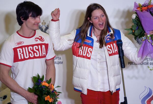 Two-time Olympic snowboarding champion Vic Wild and Olympic snowboarding bronze medalist Alyona Zavarzina during the welcoming of the Russian Olympic national team members on their arrival at Moscow's Sheremetyevo airport from Sochi. (File) Two-time Olympic snowboarding champion Vic Wild and Olympic snowboarding bronze medalist Alyona Zavarzina during the welcoming of the Russian Olympic national team members on their arrival at Moscow's Sheremetyevo airport from Sochi. (File) - Sputnik International