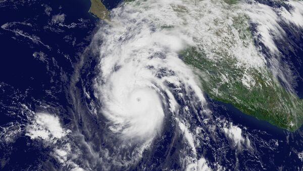 This National Oceanic and Atmospheric Administration (NOAA) satellite handout image shows Hurricane Jimena located south of Cabo San Lucas, Mexico on August 31, 2009 - Sputnik International