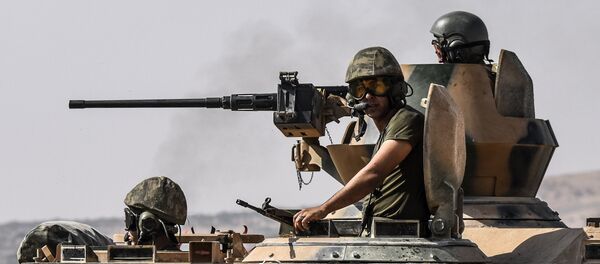 Turkish soldiers sit on a tank driving to Syria from the Turkish Syrian border city of Karkamis in the southern region of Gaziantep, on August 27, 2016 Turkish soldiers sit on a tank driving to Syria from the Turkish Syrian border city of Karkamis in the southern region of Gaziantep, on August 27, 2016 - Sputnik International