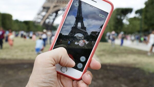 This file photo taken on July 26, 2016 shows the 'Pokemon Go' app on the screen of a smartphone, in Paris, on July 26, 2016 - Sputnik International