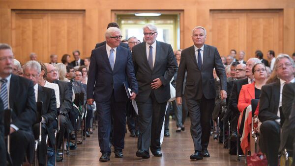 German Foreign Minister Frank-Walter Steinmeier (L) and his counterparts from France, Jean-Marc Ayrault (R) and from Poland, Witold Waszczykowski (C), arrive to attend the Ambassadors Conference at the Federal Foreign Office in Berlin on August 29, 2016 - Sputnik International