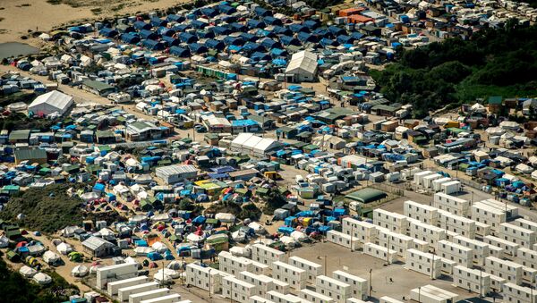This picture taken on August 16, 2016, in Calais, shows an aerial view of the jungle camp where over 9000 migrants live according to different NGOs - Sputnik International