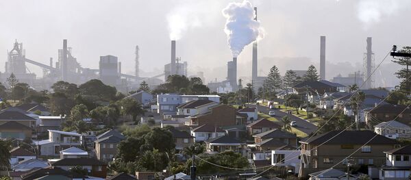 Smoke billows out of a chimney stack of steel works factories in Port Kembla, south of Sydney (File) Smoke billows out of a chimney stack of steel works factories in Port Kembla, south of Sydney (File) - Sputnik International