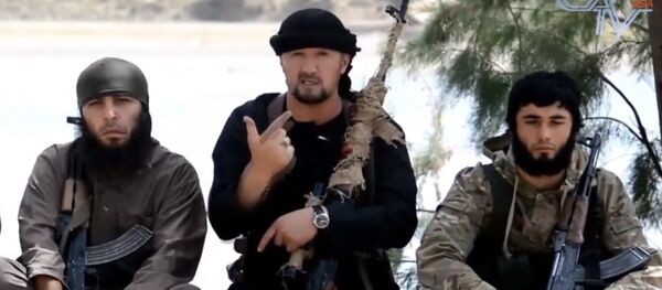 Gulmurod Khalimov (C) - Sputnik International