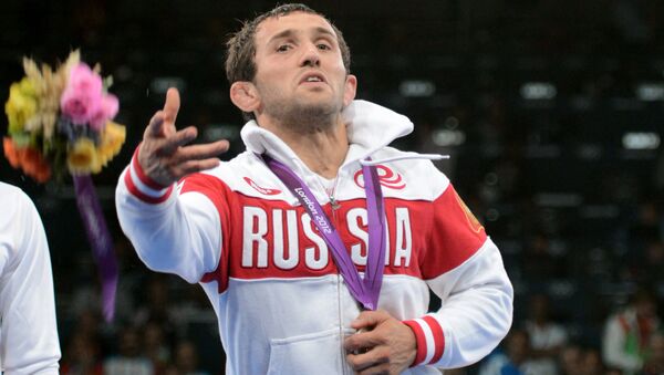 Russia's Besik Kudukhov, silver medalist in men's 60 kg freestyle wrestling at the 30th Summer Olympic Games in London, at the awarding ceremony - Sputnik International