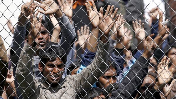Migrants demonstrate inside the Moria registration centre on the Greek island of Lesbos. - Sputnik International