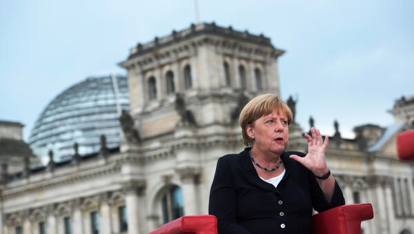 German Chancellor Angela Merkel talks during ARD summer-interview infront of Reichstag in Berlin, Germany, August 28, 2016. - Sputnik International