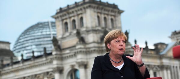German Chancellor Angela Merkel talks during ARD summer-interview infront of Reichstag in Berlin, Germany, August 28, 2016. - Sputnik International