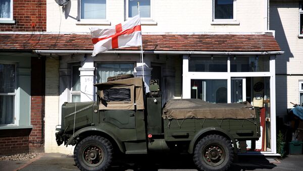 A vintage military vehicle displays an English flag in Clacton-on-Sea, a town in eastern England, where 70 percent of people voted on June 23, 2016 to leave the European Union, Britain August 23, 2016. - Sputnik International